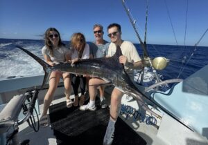 Familywithmarlinonboat